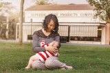 Lemoore's Christina Christiansen and her baby are part of an exhibit of breastfeeding mothers at the Adventist Family Birth Center.